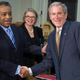 Then-President George W. Bush with Al Sharpton, alongside then-Secretary of Education Margaret Spellings, before a discussion of No Child Left Behind at General Philip Kearny School in Philadelphia, Jan. 8, 2009 (Saul Loeb/AFP/Getty Images)